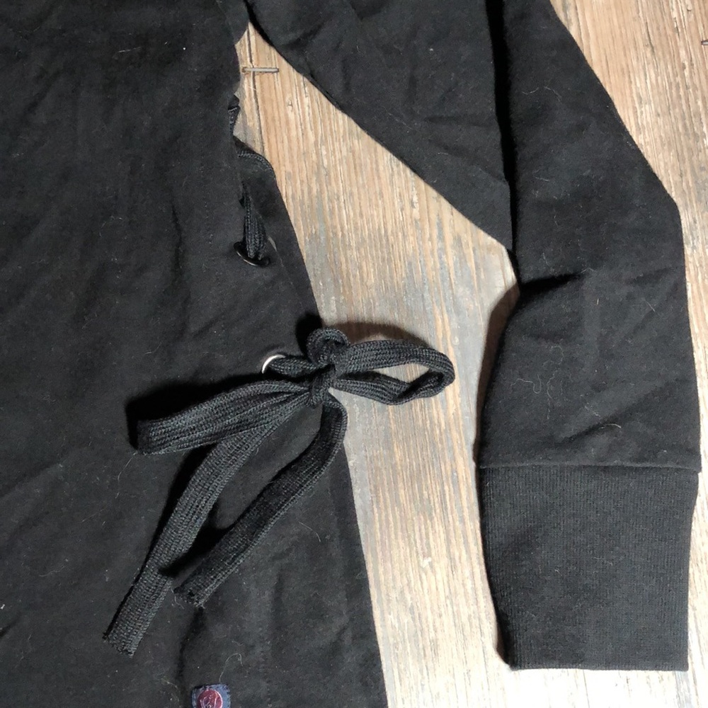 Well & Calm black sweatshirt with side tie detail